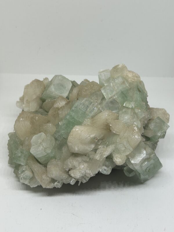 Green and white mineral crystal